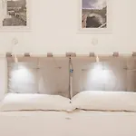 Emozione Del *